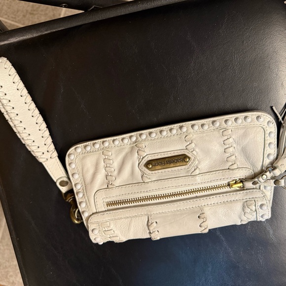 Isabella Fiore Cream Leather Clutch/wristlet with Tassel, Buckle, and studs - Picture 2 of 12